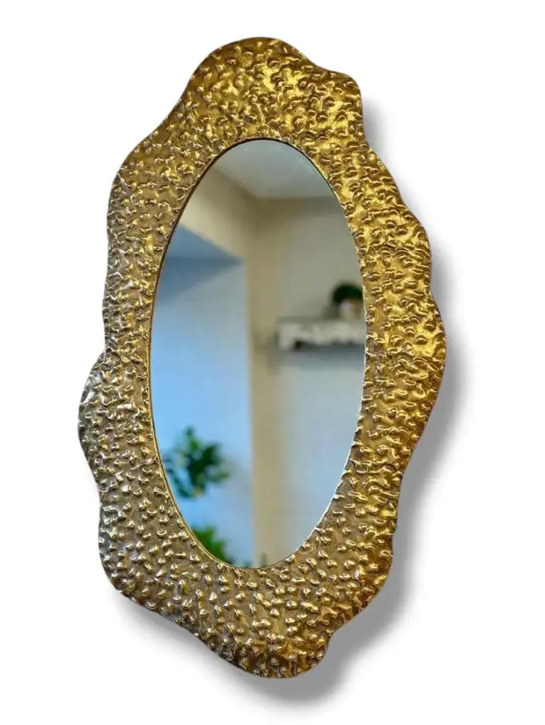 Elegant Oval Mirror with Textured Brass Frame